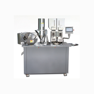 Semi-automatic capsule filler with double loaders